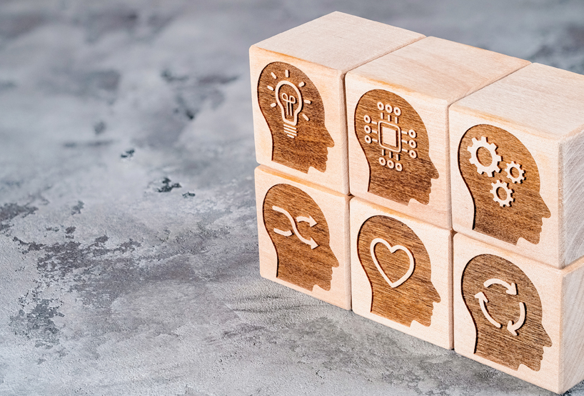 Wooden blocks with different skills icon carved into